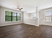 Thumbnail 4 of 14 - living room with wood plank flooring
