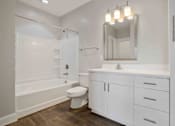 Thumbnail 5 of 14 - bathroom with white vanity