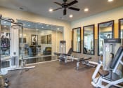 Thumbnail 20 of 25 - The Ascent at Windward apartments in Alpharetta Georgia photo of fitness center- weighted machines