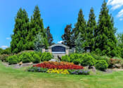 Thumbnail 25 of 25 - Alpharetta Apartments – The Ascent at Windward – monument sign with beautiful landscaping