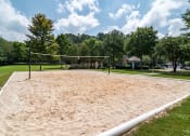 Thumbnail 20 of 27 - Lea Woodstock apartments in Woodstock, Georgia photo of sand volleyball court