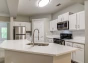 Thumbnail 5 of 27 - Lea Woodstock apartments in Woodstock, Georgia photo of kitchen