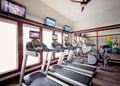 Thumbnail 20 of 27 - Wilsonville Oregon Apartments - Bridge Creek - 24 Hour Fitness Center with Treadmills and Elliptical Machines