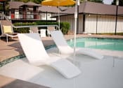 Thumbnail 17 of 27 - Two Seasonal Pools with Sundeck and Loungers - Bridge Creek Apartments - Wilsonville Oregon