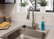 Thumbnail 9 of 27 - Modern Pet-Friendly Apartments - Wilsonville - Bridge Creek - Kitchens with Farmhouse Sink