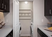 Thumbnail 12 of 27 - Modern Apartments Wilsonville - Bridge Creek - Kitchens Feature Large Pantry