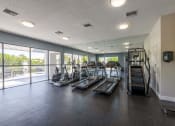 Thumbnail 3 of 33 - Apartments In Coconut Creek for Rent – Waterview at Coconut Creek – fitness center with cardio equipment