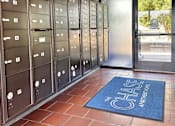 Thumbnail 3 of 20 - a bunch of lockers in a room with a door