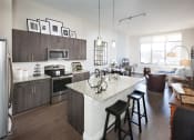 Thumbnail 17 of 63 - Spacious Kitchen with Pantry Cabinet at Harrison at Reston Town Center, Reston, VA, 20190