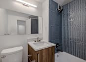 Thumbnail 14 of 59 - Quebec House light scheme renovated studio bathroom