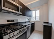 Thumbnail 2 of 59 - Quebec House beautifully renovated kitchen dark scheme