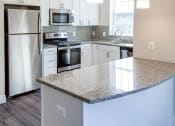 Thumbnail 2 of 22 - The Village at Worman's Mill kitchen light cabinets