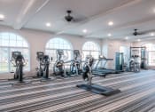 Thumbnail 12 of 22 - Fitness Center With Updated Equipment at Village Center Apartments At Wormans Mill*, Frederick, Maryland
