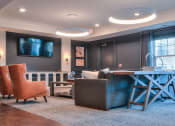 Thumbnail 15 of 22 - Relaxing Tv Media Room at Village Center Apartments At Wormans Mill*, Maryland, 21701
