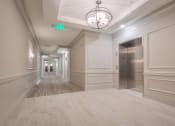 Thumbnail 7 of 22 - Hallway at Village Center Apartments At Wormans Mill*, Frederick