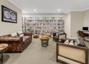 Thumbnail 18 of 26 - a living room filled with furniture and a library