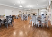 Thumbnail 19 of 26 - a large dining room with tables and chairs