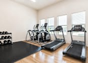 Thumbnail 8 of 33 - Fitness center with cardio and weight equipment at Silver Ridge Apartments, Idaho, 83642