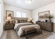 Thumbnail 27 of 33 - Cozy bedroom with neutral tones and western decor at Silver Ridge Apartments, Meridian, ID 83642