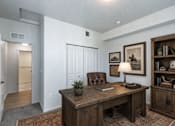 Thumbnail 30 of 33 - Home office with rustic desk and decor at Silver Ridge Apartments, Meridian, 83642