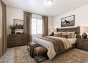 Thumbnail 24 of 33 - Spacious bedroom with rustic wood headboard and decor at Silver Ridge Apartments, Meridian, Idaho