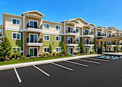 Thumbnail 4 of 20 - Exterior building and parking lot at The Ellison Apartments, Layton, 84041