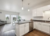 Thumbnail 6 of 56 - the preserve at ballantyne commons apartment kitchen and living room