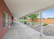 Thumbnail 18 of 31 - the preserve at ballantyne commons spacious covered patio with views of the community garden