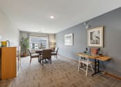 Thumbnail 49 of 58 - an open living room and dining room with a table and chairs