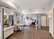 Thumbnail 41 of 58 - a dentist office with white walls and wood floors