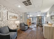 Thumbnail 42 of 58 - a lobby with chairs and a reception desk