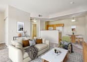 Thumbnail 2 of 36 - A living room with a white couch and a coffee table.