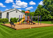 Thumbnail 16 of 16 - A playground with a yellow slide and purple poles.