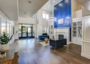 Thumbnail 4 of 26 - Grand lobby with fireplace and high ceilings at The Beckstead Apartments, South Jordan, 84095