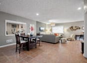 Thumbnail 5 of 14 - Open concept living and dining area with modern finishes at Carver Ridge Townhomes Apartments, Chaska, 55318