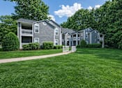 Thumbnail 4 of 26 - Exterior view of apartment buildings with balconies at Delta Crossing Apartments, Charlotte, 28212