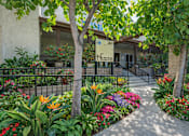Thumbnail 2 of 16 - A garden with a sign that says "2801" on it.