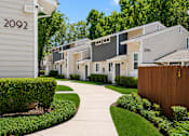 Thumbnail 3 of 16 - A row of houses numbered 2092 to 2099.
