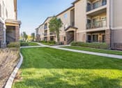 Thumbnail 13 of 31 - the preserve at ballantyne commons exterior of apartments with grass
