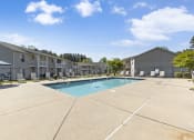 Thumbnail 21 of 29 - the preserve at ballantyne commons pool and apartment buildings