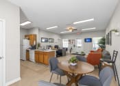 Thumbnail 19 of 29 - our apartments have a dining room and kitchen with a table and chairs
