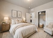 Thumbnail 17 of 21 - Bedroom with neutral tones and open closet at Harper Ridge Apartments, Meridian, 83642