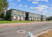 Thumbnail 29 of 35 - the building where the hotel is located is shown