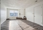 Thumbnail 3 of 35 - the living room of an apartment with a couch and a door
