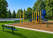 Thumbnail 6 of 21 - Playground with slide and pool area at Northview Park Apartments, Sterling Heights