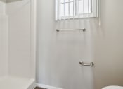 Thumbnail 27 of 56 - a bathroom with a window and a shower and a toilet at Vista Linda, Santa Fe, NM
