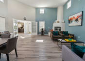 Thumbnail 52 of 56 - a living room and dining room with blue walls and a fireplace at Vista Linda, New Mexico 87507