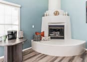 Thumbnail 53 of 56 - a living room with a fireplace and a coffee table at Vista Linda, Santa Fe, NM 87507