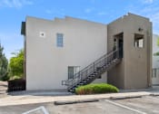 Thumbnail 56 of 56 - A building with a number 4 on it has a staircase leading to the door at Vista Linda, Santa Fe, NM 87507