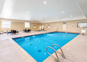 Thumbnail 9 of 20 - Indoor swimming pool with seating area at The Ellison Apartments, Utah, 84041